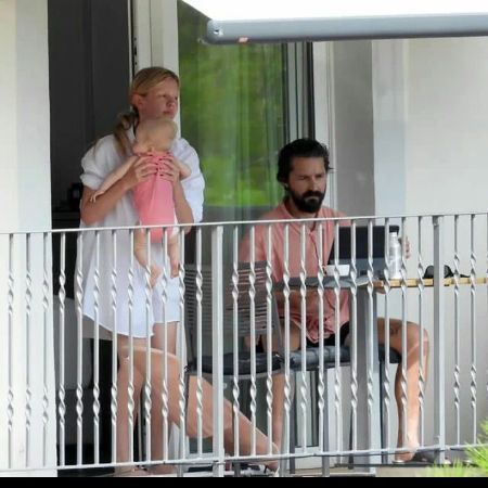 Mia Goth and her husband, Shia LaBeouf, were photographed with their daughter on their balcony